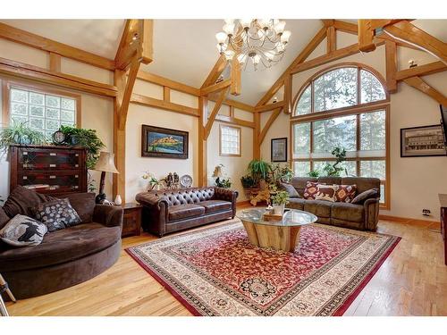 106 Lougheed Circle, Banff, AB - Indoor Photo Showing Living Room With Fireplace