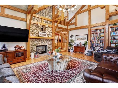 106 Lougheed Circle, Banff, AB - Indoor Photo Showing Living Room With Fireplace