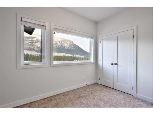 64-209 Stewart Creek Rise, Canmore, AB - Indoor Photo Showing Other Room
