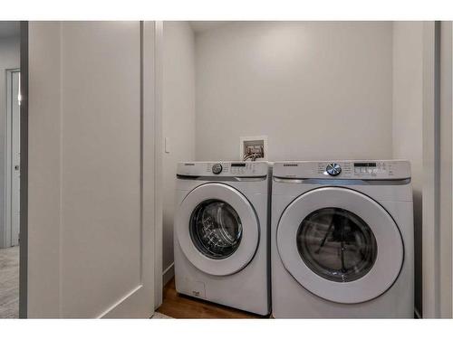 62-209 Stewart Creek Rise, Canmore, AB - Indoor Photo Showing Laundry Room