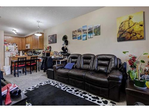 205-343 Marten Street, Banff, AB - Indoor Photo Showing Living Room