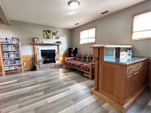 46 Pineview Road, Whitecourt, AB - Indoor Photo Showing Living Room With Fireplace