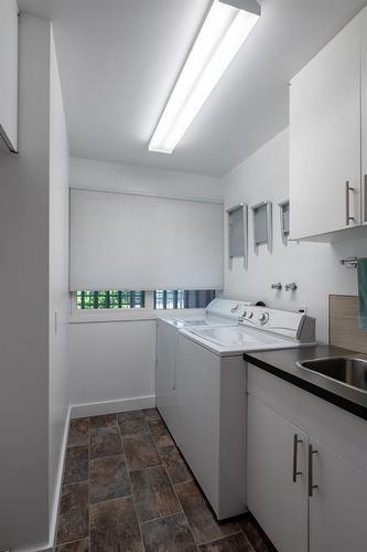 4704 Sakwatamau Drive, Whitecourt, AB - Indoor Photo Showing Laundry Room