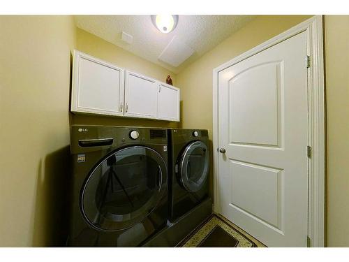 1105 9 Avenue Se, Slave Lake, AB - Indoor Photo Showing Laundry Room