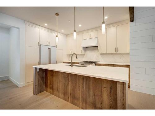 274 C&D Three Sisters Drive, Canmore, AB - Indoor Photo Showing Kitchen With Upgraded Kitchen