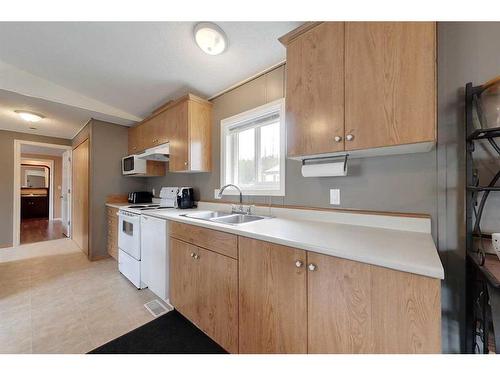 2295 Waskway Drive, Wabasca, AB - Indoor Photo Showing Kitchen With Double Sink