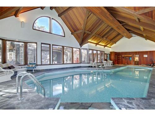 417-421 Muskrat Street, Banff, AB - Indoor Photo Showing Other Room With In Ground Pool