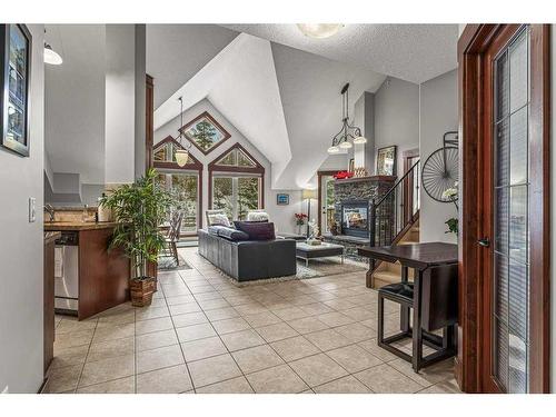 313-155 Crossbow Place, Canmore, AB - Indoor With Fireplace