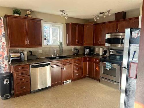 118 Moberly Road, Grande Cache, AB - Indoor Photo Showing Kitchen With Stainless Steel Kitchen