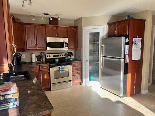 118 Moberly Road, Grande Cache, AB - Indoor Photo Showing Kitchen With Stainless Steel Kitchen