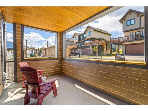 204I-209 Stewart Creek Rise, Canmore, AB - Outdoor With Deck Patio Veranda