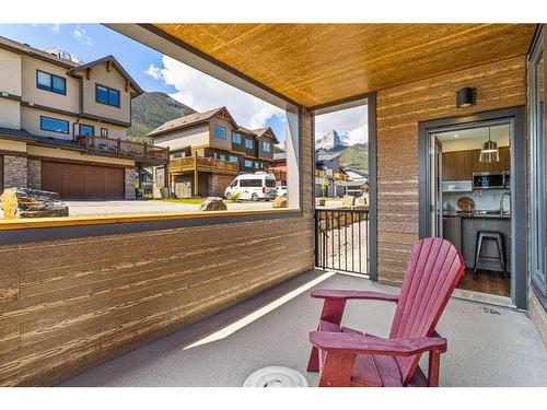 204I-209 Stewart Creek Rise, Canmore, AB - Outdoor With Deck Patio Veranda With Exterior