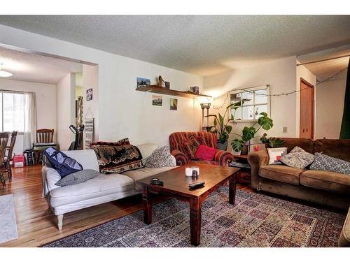 208 Otter Street, Banff, AB - Indoor Photo Showing Living Room