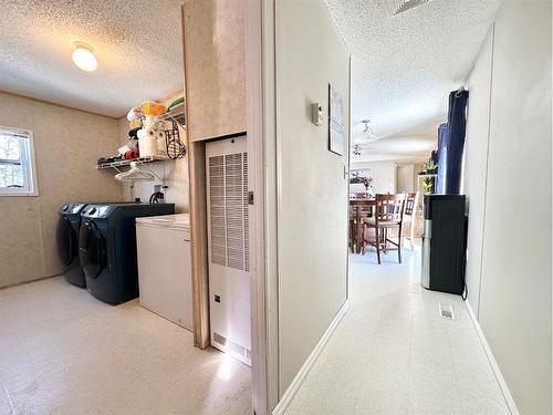 18, 592074 Range Road 121, Rural Woodlands County, AB - Indoor Photo Showing Laundry Room