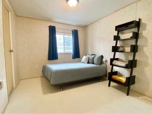 18, 592074 Range Road 121, Rural Woodlands County, AB - Indoor Photo Showing Bedroom