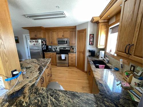 302-5037 7 Avenue, Edson, AB - Indoor Photo Showing Kitchen With Double Sink