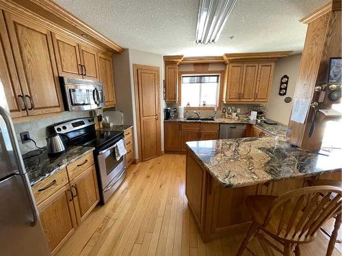 302-5037 7 Avenue, Edson, AB - Indoor Photo Showing Kitchen With Stainless Steel Kitchen
