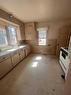 102 Geikie Street, Jasper, AB  - Indoor Photo Showing Kitchen With Double Sink 