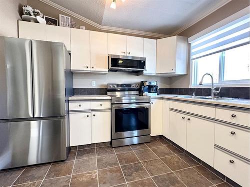 49 Wedow Drive, Whitecourt, AB - Indoor Photo Showing Kitchen With Double Sink