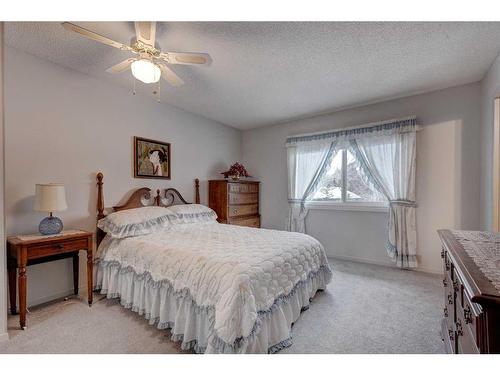 128 Nahanni Drive, Banff, AB - Indoor Photo Showing Bedroom