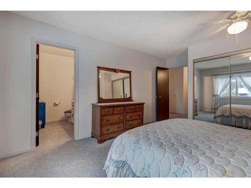 128 Nahanni Drive, Banff, AB - Indoor Photo Showing Bedroom
