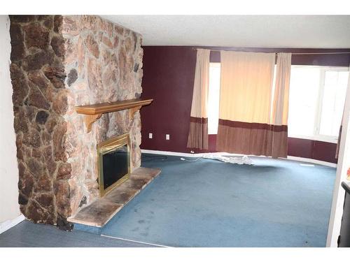 5505 13 Avenue, Edson, AB - Indoor With Fireplace