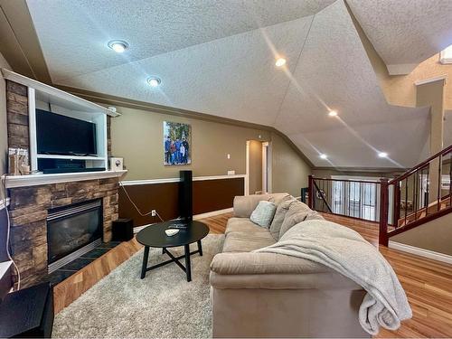 47 Poplar Drive, Whitecourt, AB - Indoor Photo Showing Living Room With Fireplace