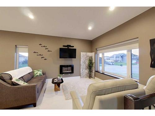 321 13 Street Se, Slave Lake, AB - Indoor Photo Showing Living Room With Fireplace