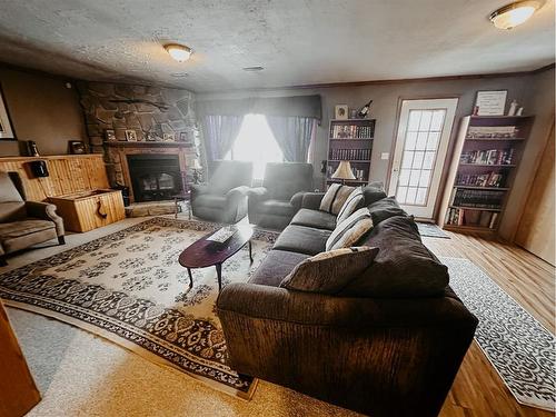 8 Park Drive, Whitecourt, AB - Indoor Photo Showing Living Room With Fireplace