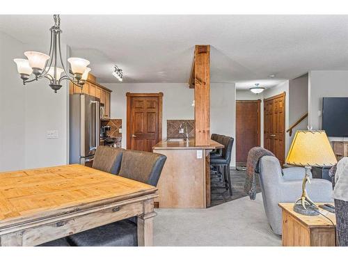 306-170 Crossbow Place, Canmore, AB - Indoor Photo Showing Dining Room