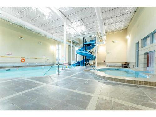 216-901 Mountain Street, Canmore, AB - Indoor Photo Showing Other Room With In Ground Pool