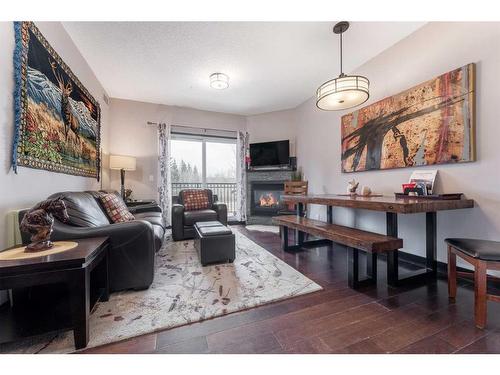 216-901 Mountain Street, Canmore, AB - Indoor With Fireplace