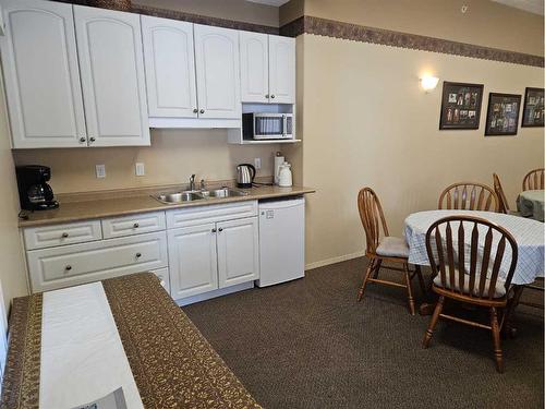 202-777 48 Street, Edson, AB - Indoor Photo Showing Kitchen With Double Sink