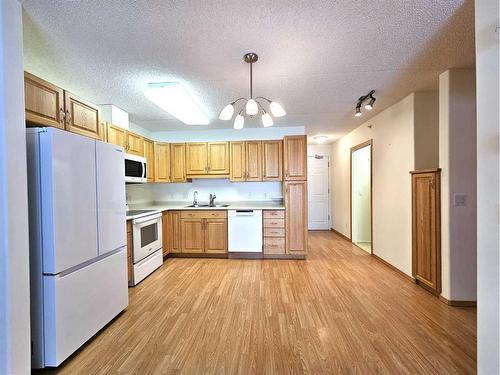 202-777 48 Street, Edson, AB - Indoor Photo Showing Kitchen With Double Sink