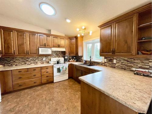 3-24426 East River Road, Rural Yellowhead County, AB - Indoor Photo Showing Kitchen With Double Sink