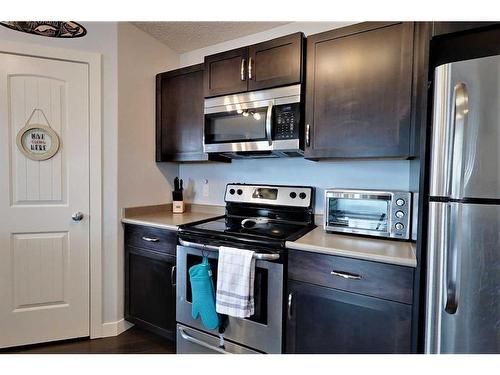 301 12 Street Se, Slave Lake, AB - Indoor Photo Showing Kitchen With Stainless Steel Kitchen