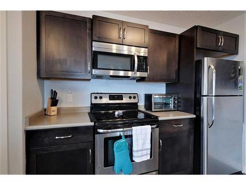 301 12 Street Se, Slave Lake, AB - Indoor Photo Showing Kitchen With Stainless Steel Kitchen