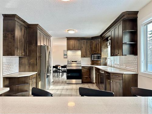 63 Chickadee Drive, Whitecourt, AB - Indoor Photo Showing Kitchen With Upgraded Kitchen