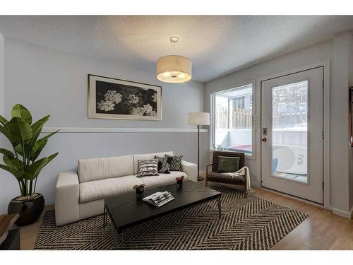 B-116 Otter Street, Banff, AB - Indoor Photo Showing Living Room