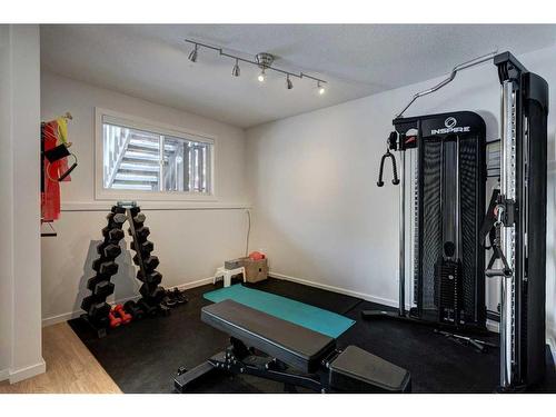 B-116 Otter Street, Banff, AB - Indoor Photo Showing Gym Room