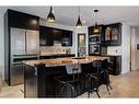 B-116 Otter Street, Banff, AB  - Indoor Photo Showing Kitchen With Upgraded Kitchen 