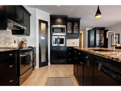B-116 Otter Street, Banff, AB - Indoor Photo Showing Kitchen With Upgraded Kitchen