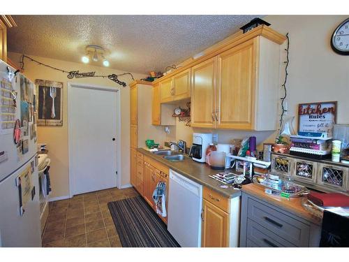 30-101 Mill Street, Hinton, AB - Indoor Photo Showing Kitchen With Double Sink