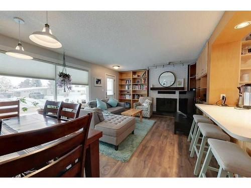 309 5 Street Ne, Slave Lake, AB - Indoor Photo Showing Living Room With Fireplace