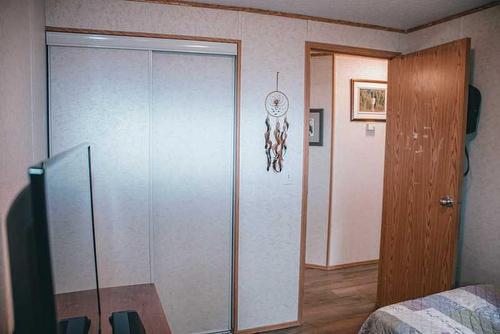 49 Nielsen Drive, Island Lake South, AB - Indoor Photo Showing Bedroom