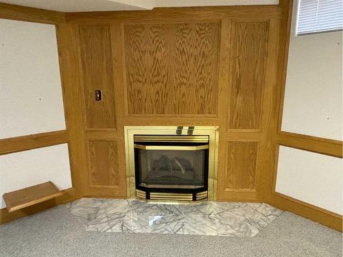 60 Baxter Crescent, Whitecourt, AB - Indoor With Fireplace