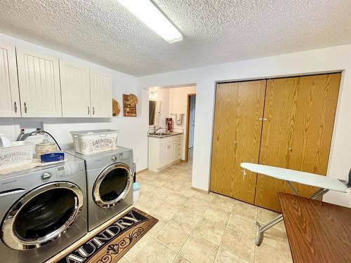 210 Seabolt Estates, Rural Yellowhead County, AB - Indoor Photo Showing Laundry Room
