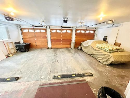 210 Seabolt Estates, Rural Yellowhead County, AB - Indoor Photo Showing Garage