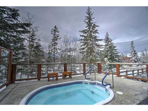 213-190 Kananaskis Way, Canmore, AB - Outdoor With In Ground Pool