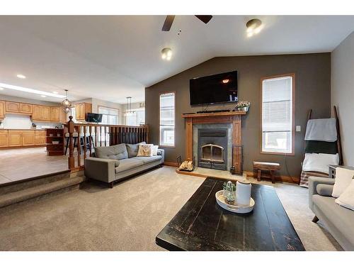 73017 Southshore Drive East, Widewater, AB - Indoor Photo Showing Living Room With Fireplace